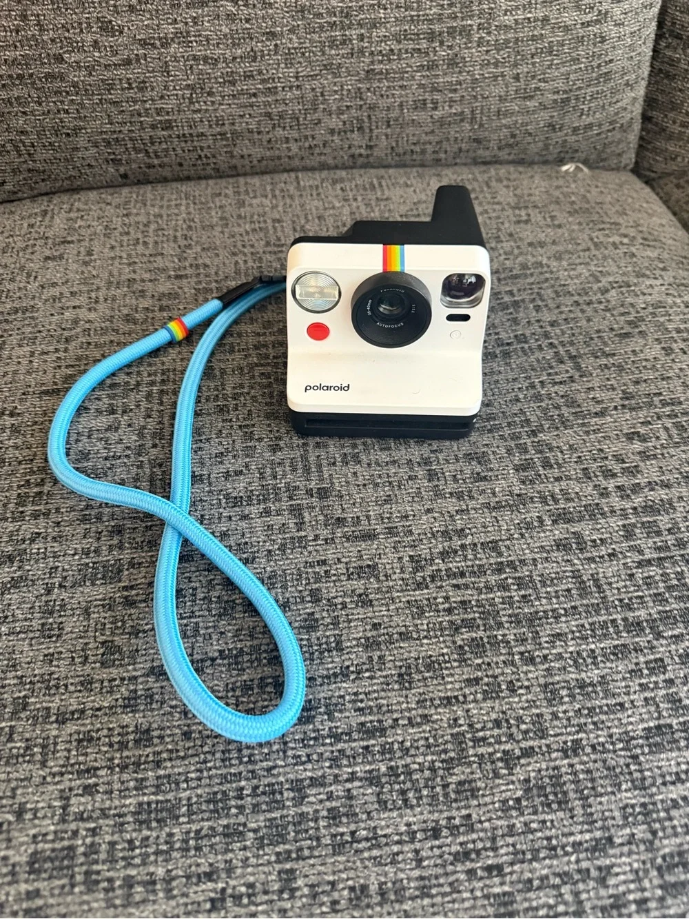 Polaroid White Instant Camera with Black Base and Red Shutter